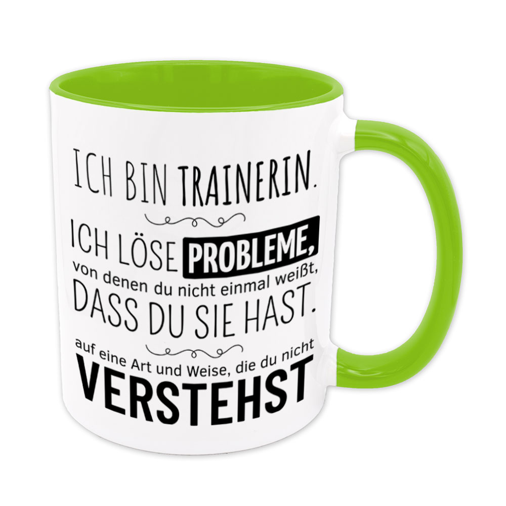Tasse hellgrün: Ich bin Trainerin. Ich löse Probleme, von denen du nicht einmal weißt, dass du sie hast, auf eine Art und Weise, die du nicht verstehst. Spruchtasse, lustige Tasse
